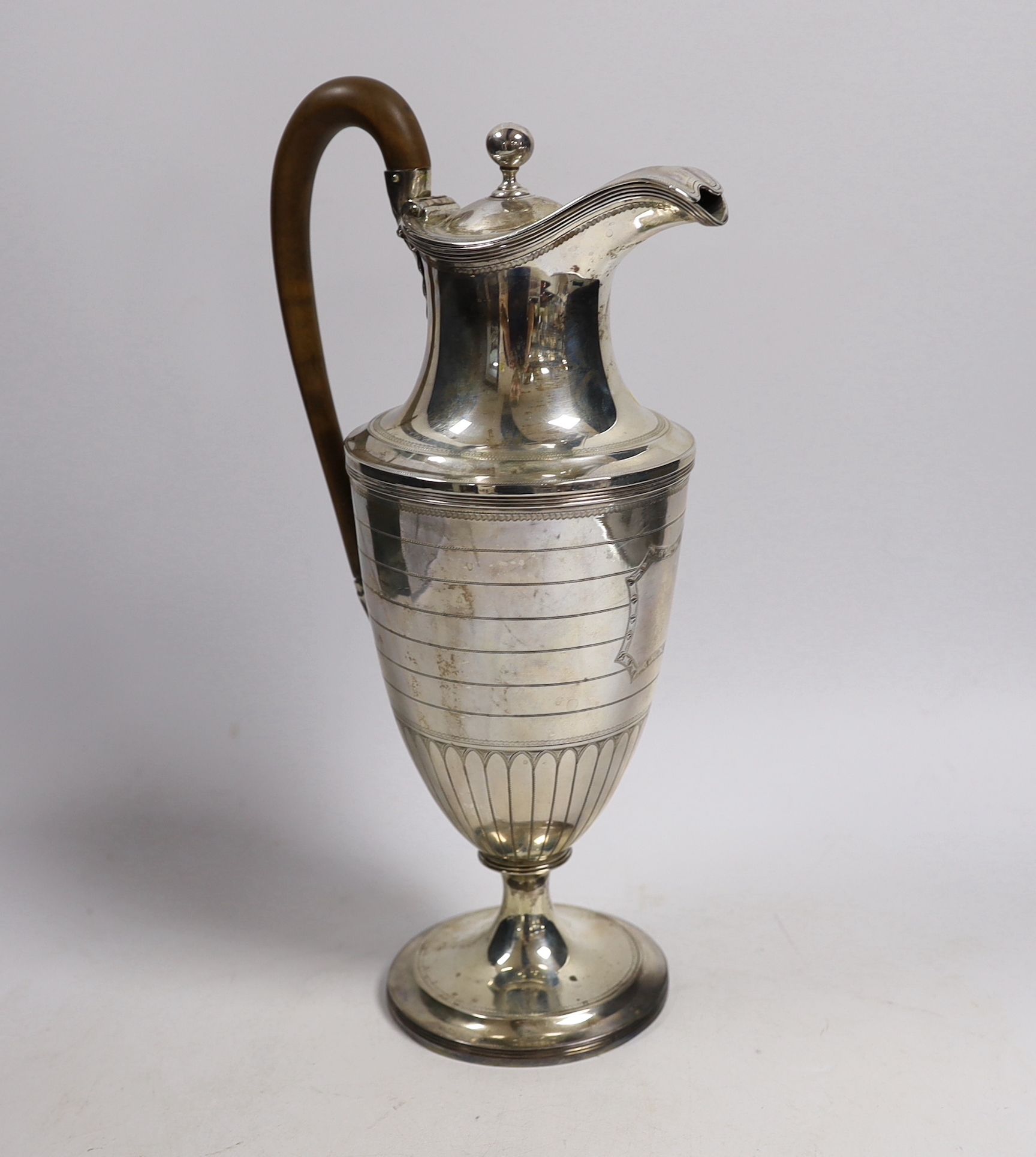 A George III silver hot water pot, London, 1792, by Henry Chawner, height 30.3cm, gross weight 12.8oz.